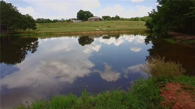 a view of a lake with beach