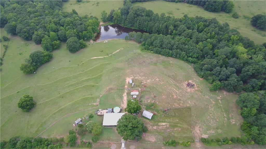 876 Simpson Mill Road Locust Grove, GA 30248 - Photo 4 of 40 an aerial view of a house