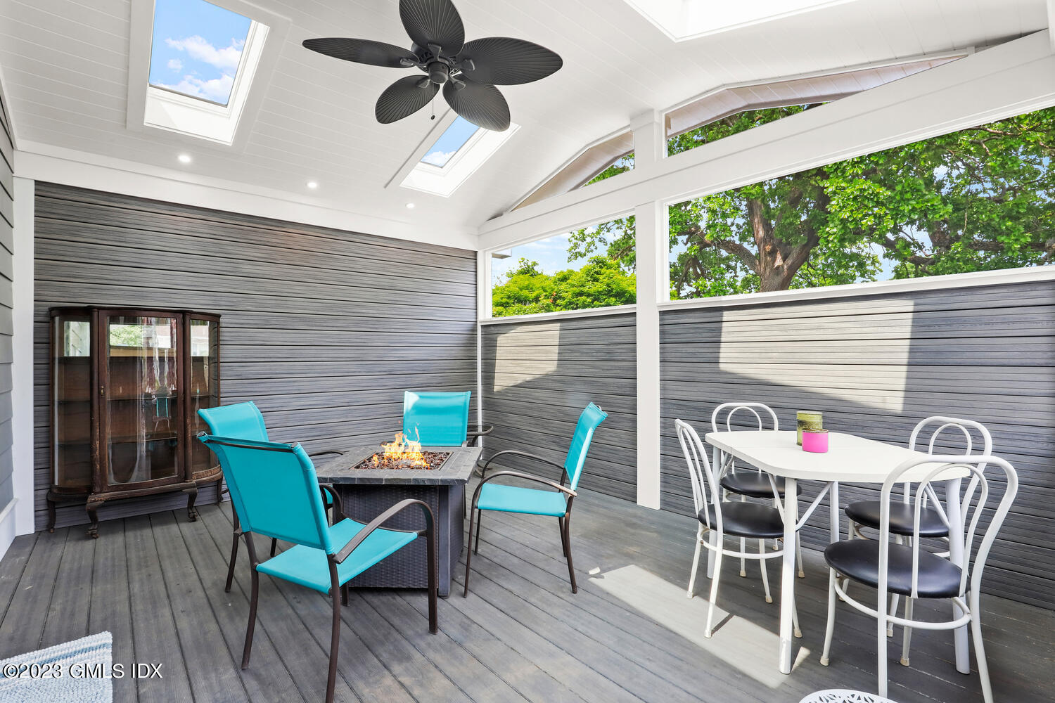 5 Oxer Place Greenwich, CT 06830 - Photo 15 of 37 a patio with table and chairs