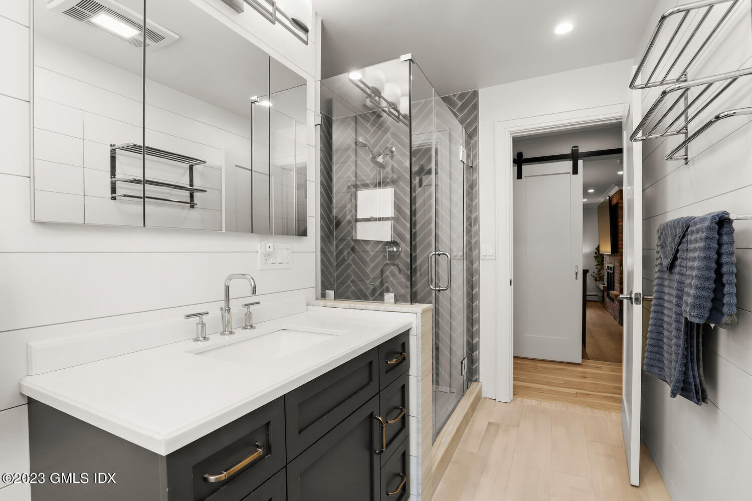 5 Oxer Place Greenwich, CT 06830 - Photo 17 of 37 a bathroom with a sink vanity and a mirror