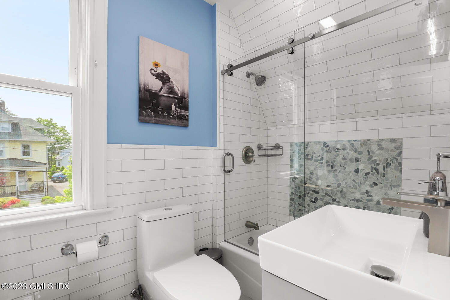 5 Oxer Place Greenwich, CT 06830 - Photo 22 of 37 a bathroom with a sink a toilet and shower