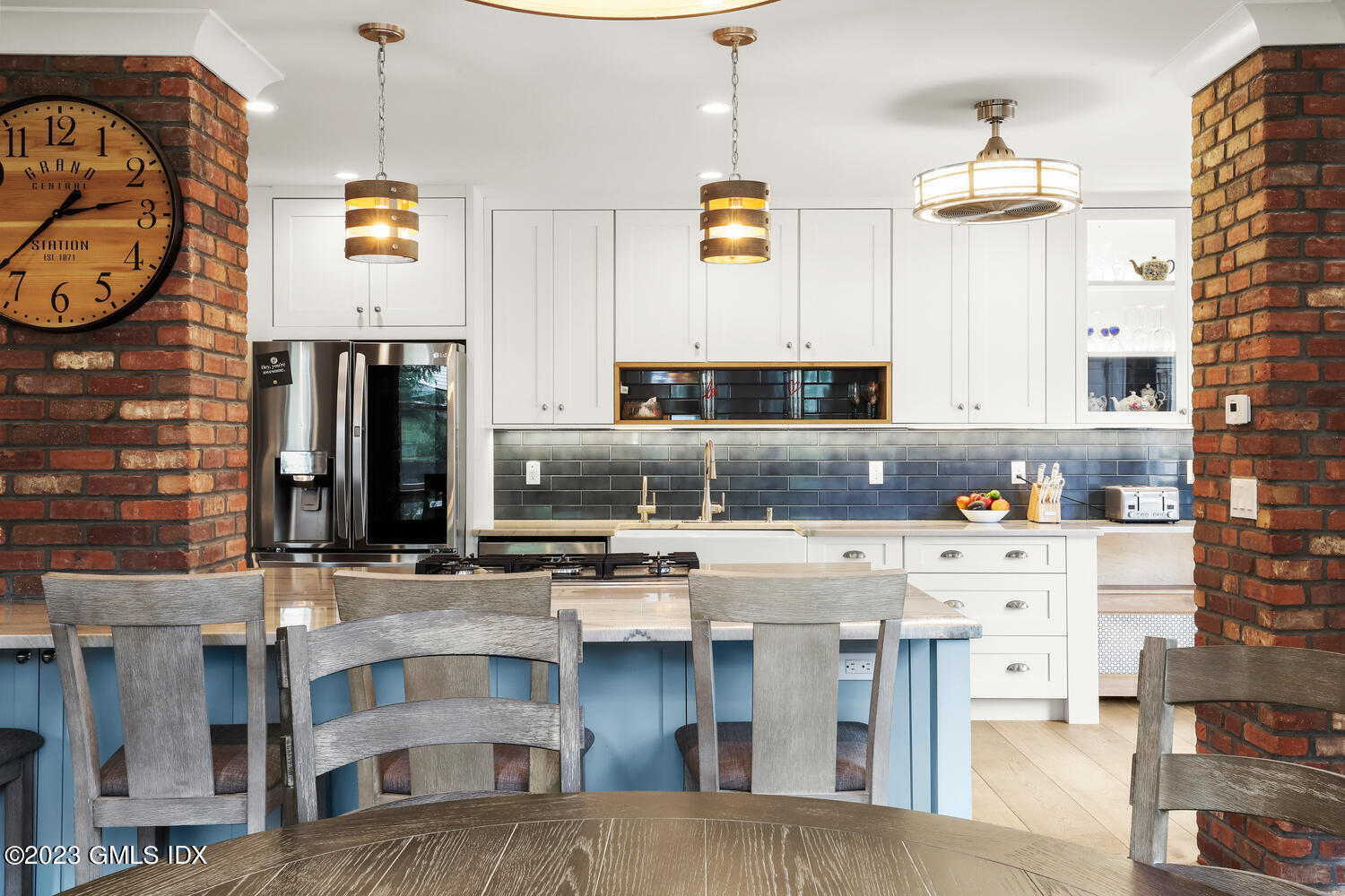 5 Oxer Place Greenwich, CT 06830 - Photo 7 of 37 a kitchen with stainless steel appliances granite countertop a stove and cabinets