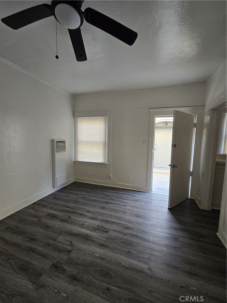 551 West 10th Street, Unit 3 Long Beach, CA 90813 - Photo 11 of 22 a view of an empty room and wooden floor