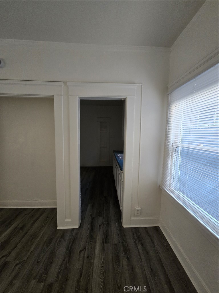 551 West 10th Street, Unit 3 Long Beach, CA 90813 - Photo 18 of 22 a view of a room with wooden floor and a window