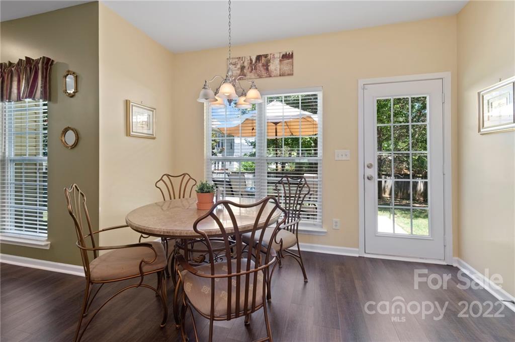 4905 Missi Lane Fort Mill, SC 29708 - Photo 12 of 34 a view of a dining room with furniture and chandelier