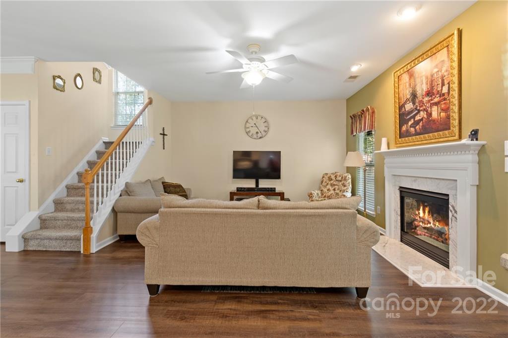 4905 Missi Lane Fort Mill, SC 29708 - Photo 14 of 34 a living room with furniture and a fireplace