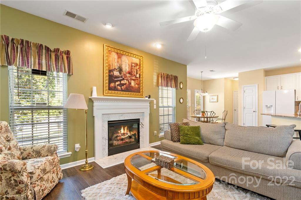 4905 Missi Lane Fort Mill, SC 29708 - Photo 16 of 34 a living room with furniture and a fireplace
