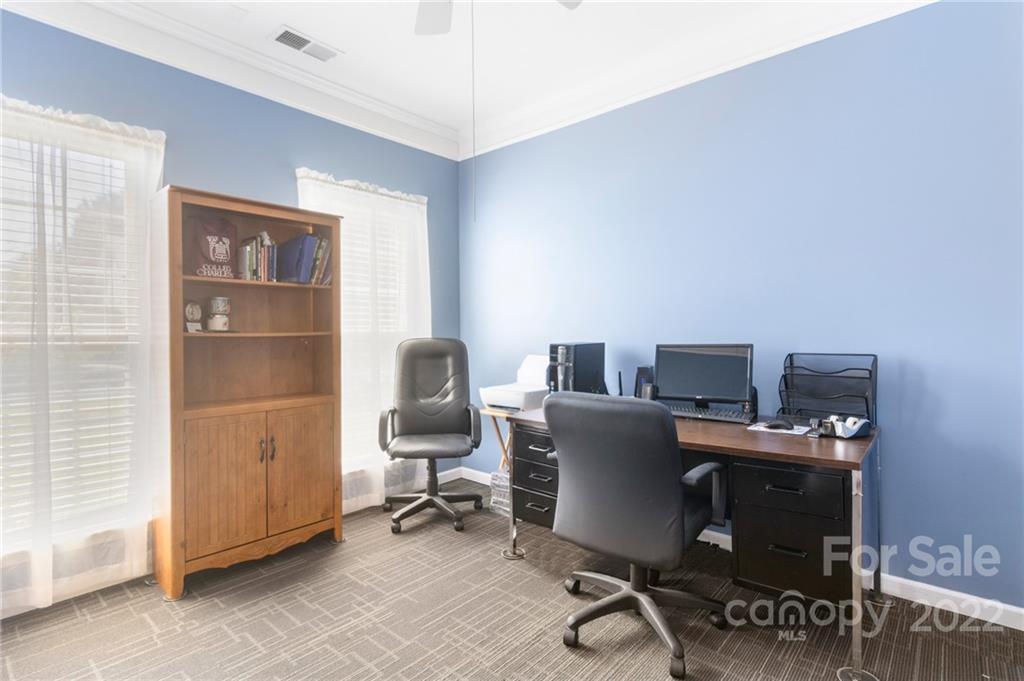 4905 Missi Lane Fort Mill, SC 29708 - Photo 19 of 34 a view of a workspace with furniture and a window