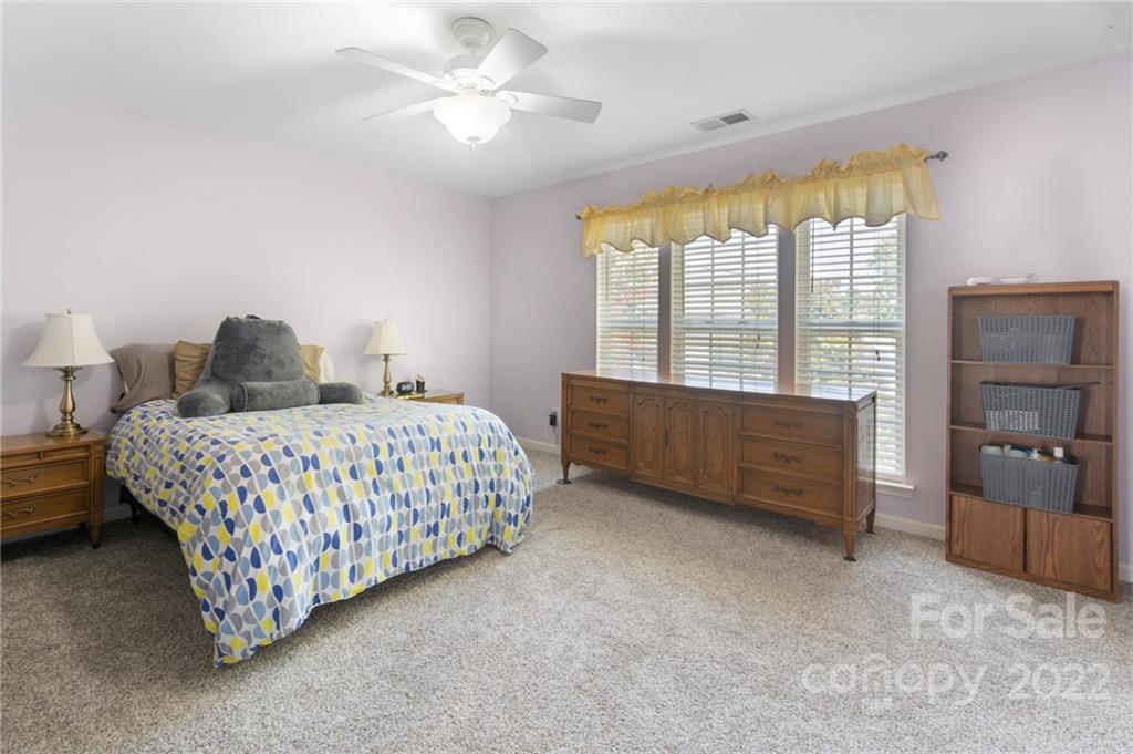 4905 Missi Lane Fort Mill, SC 29708 - Photo 22 of 34 a bedroom with a bed and a tv