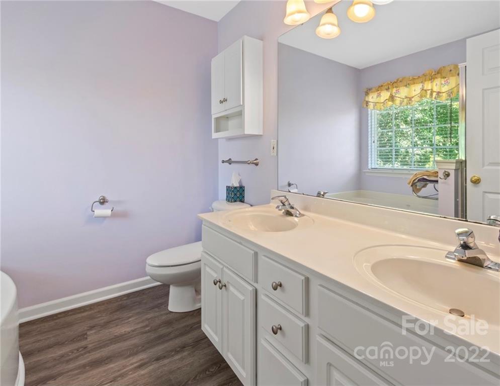4905 Missi Lane Fort Mill, SC 29708 - Photo 23 of 34 a bathroom with a sink and a toilet