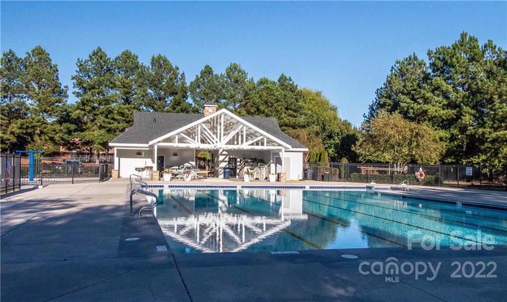 4905 Missi Lane Fort Mill, SC 29708 - Photo 32 of 34 a view of a house with a yard