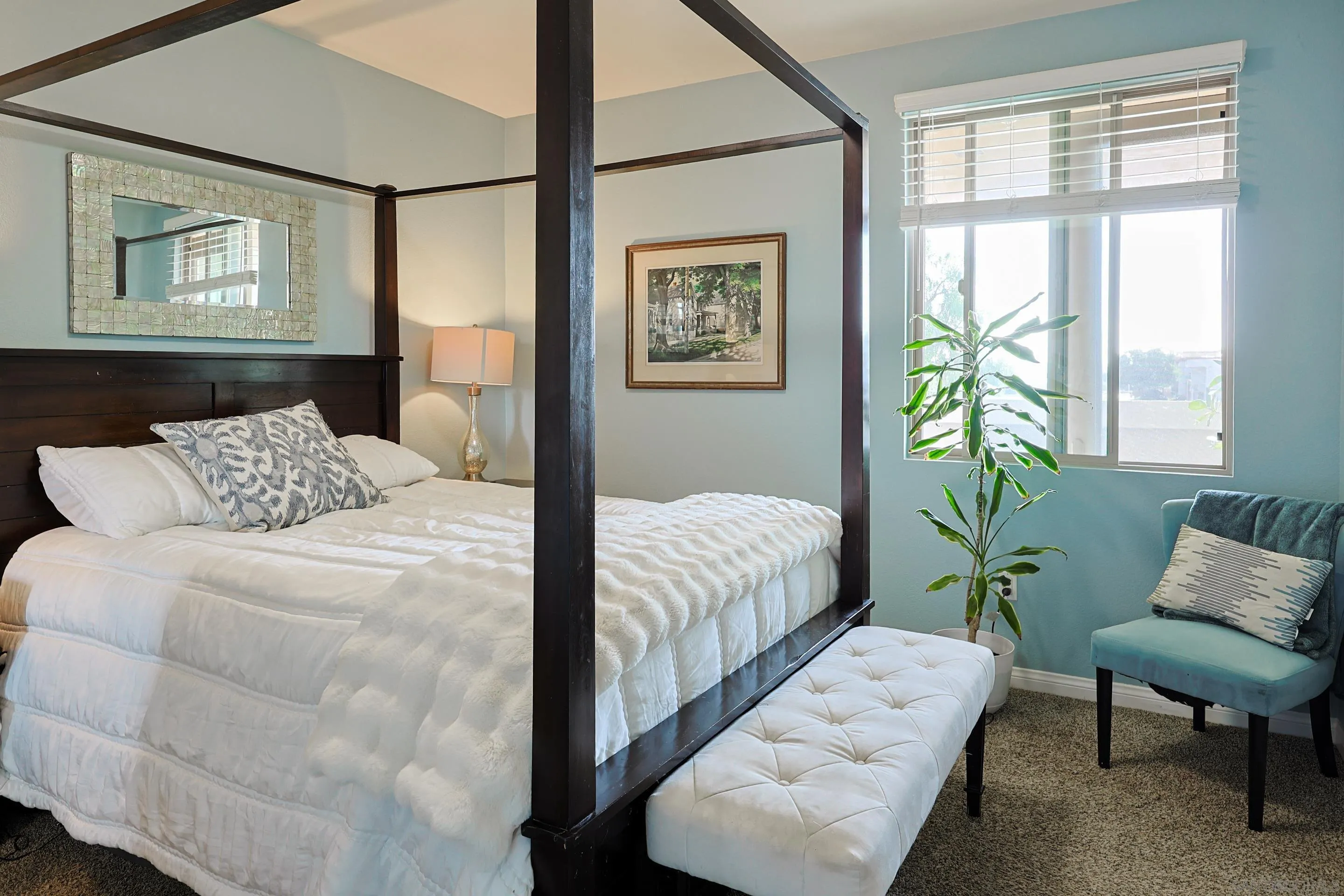 3887 Pell Place, Unit 229 San Diego, CA 92130 - Photo 12 of 49 a bedroom with a bed and a couch next to a window