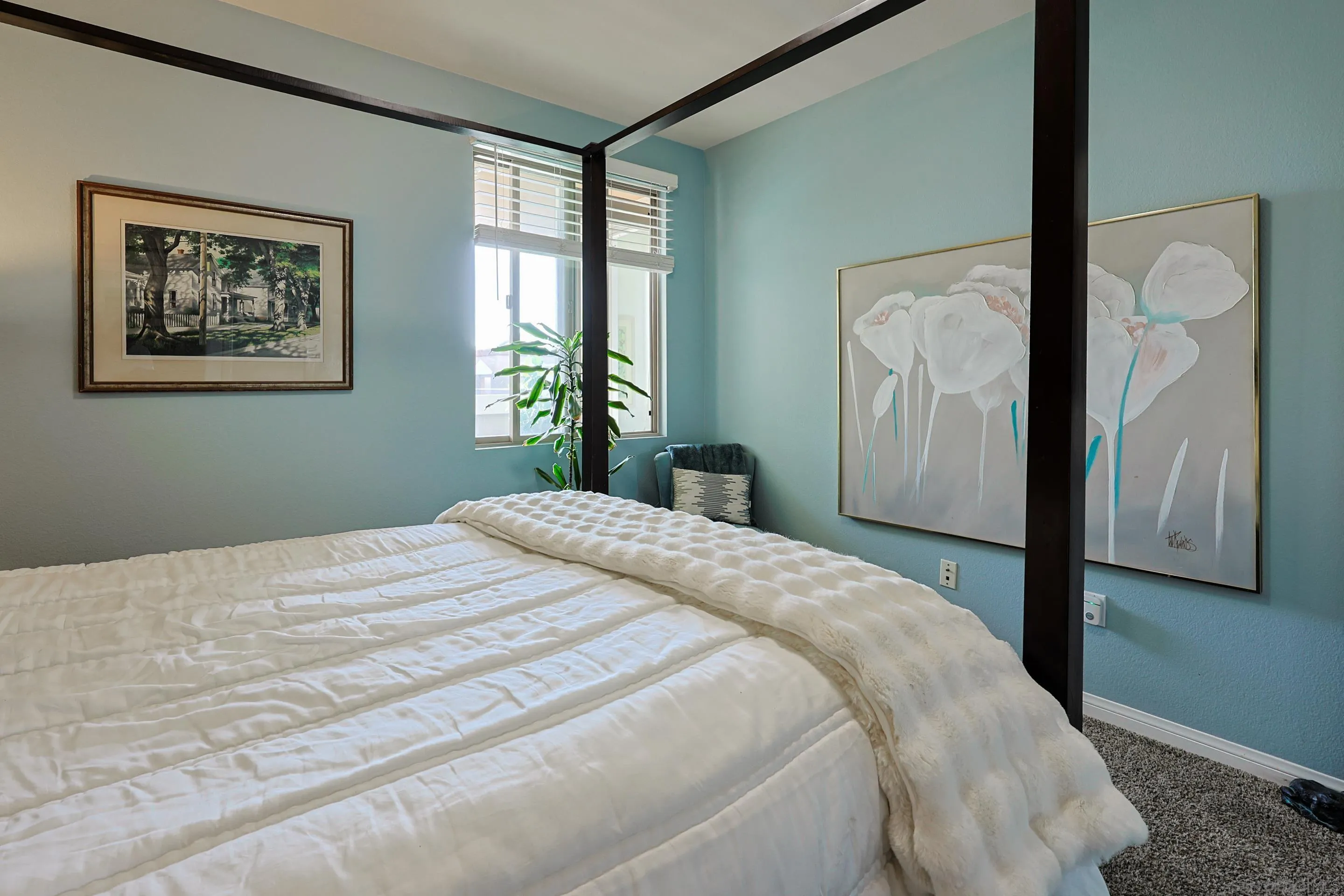 3887 Pell Place, Unit 229 San Diego, CA 92130 - Photo 13 of 49 a bedroom with a bed and a large mirror