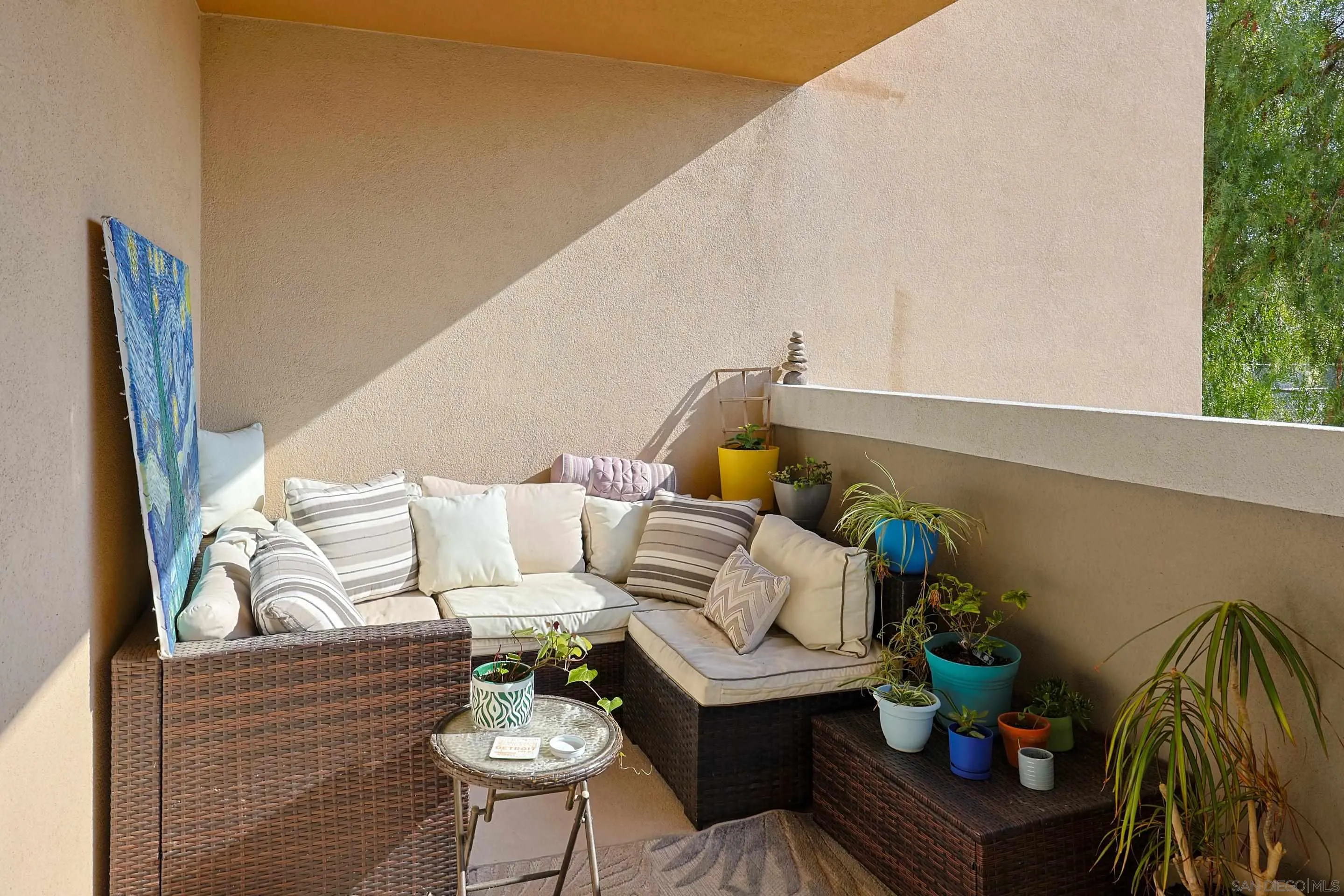 3887 Pell Place, Unit 229 San Diego, CA 92130 - Photo 17 of 49 a living room with furniture and wooden floor