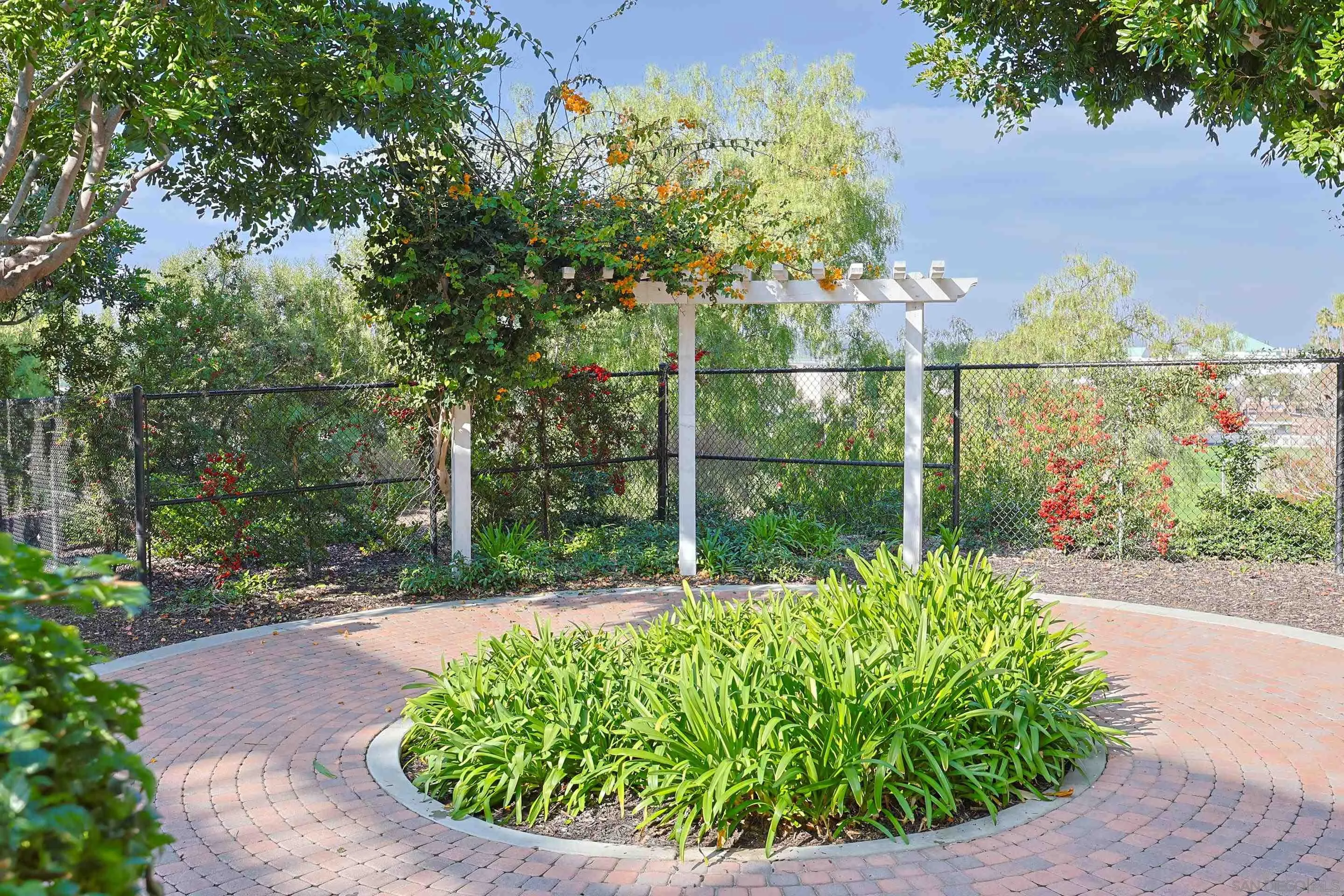 3887 Pell Place, Unit 229 San Diego, CA 92130 - Photo 32 of 49 a garden view