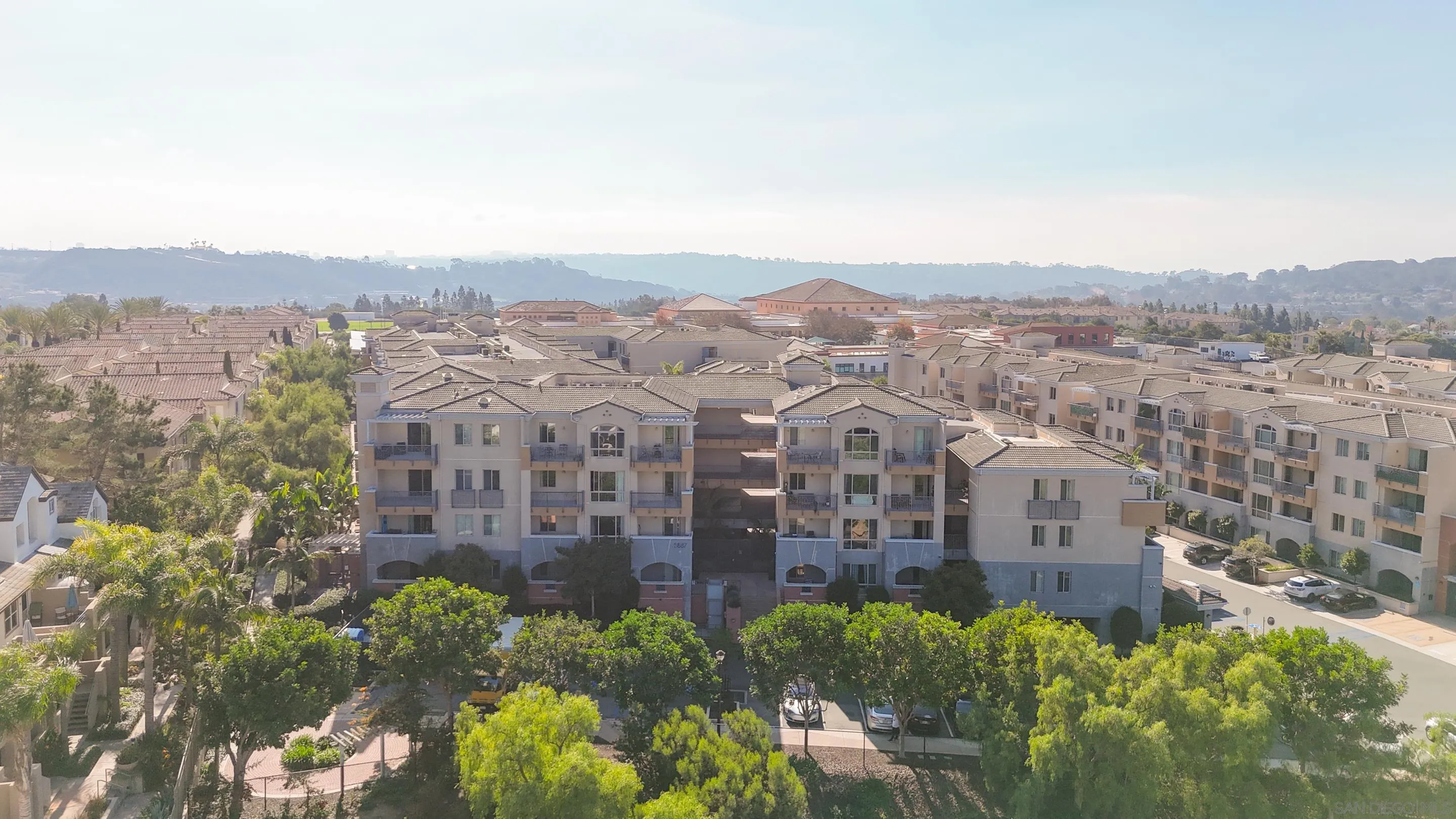 3887 Pell Place, Unit 229 San Diego, CA 92130 - Photo 35 of 49 a view of a city with tall buildings