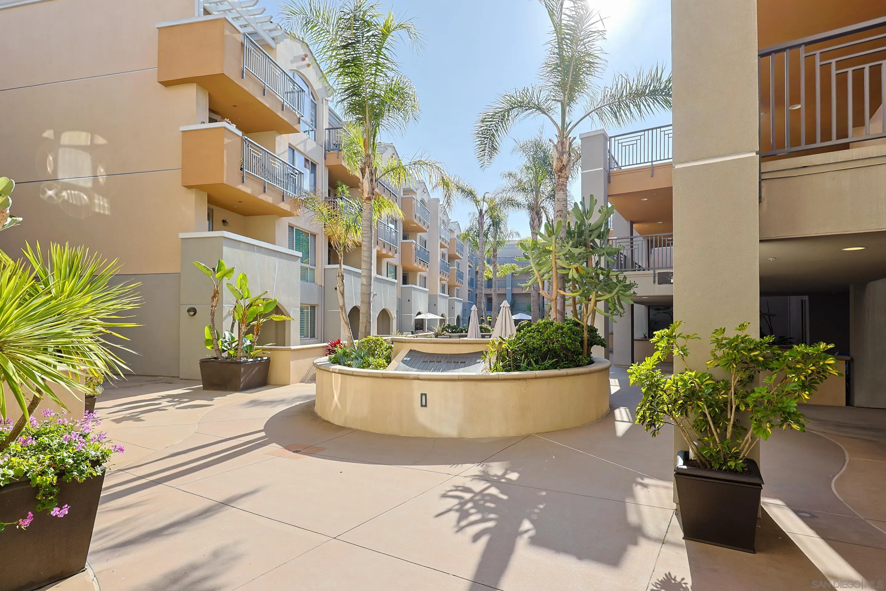 3887 Pell Place, Unit 229 San Diego, CA 92130 - Photo 43 of 49 a view of a house with potted plants