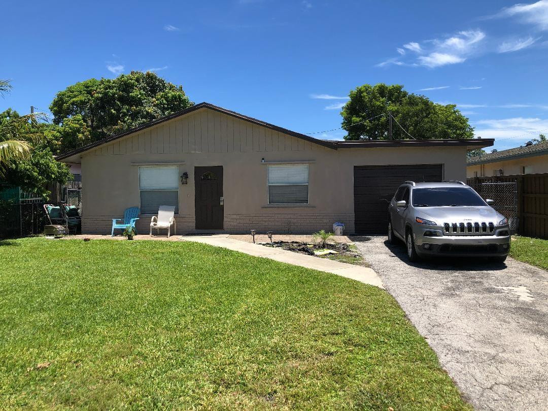 Undisclosed Address Boca Raton, FL 33487 - Photo 13 of 15 a house view with a garden space