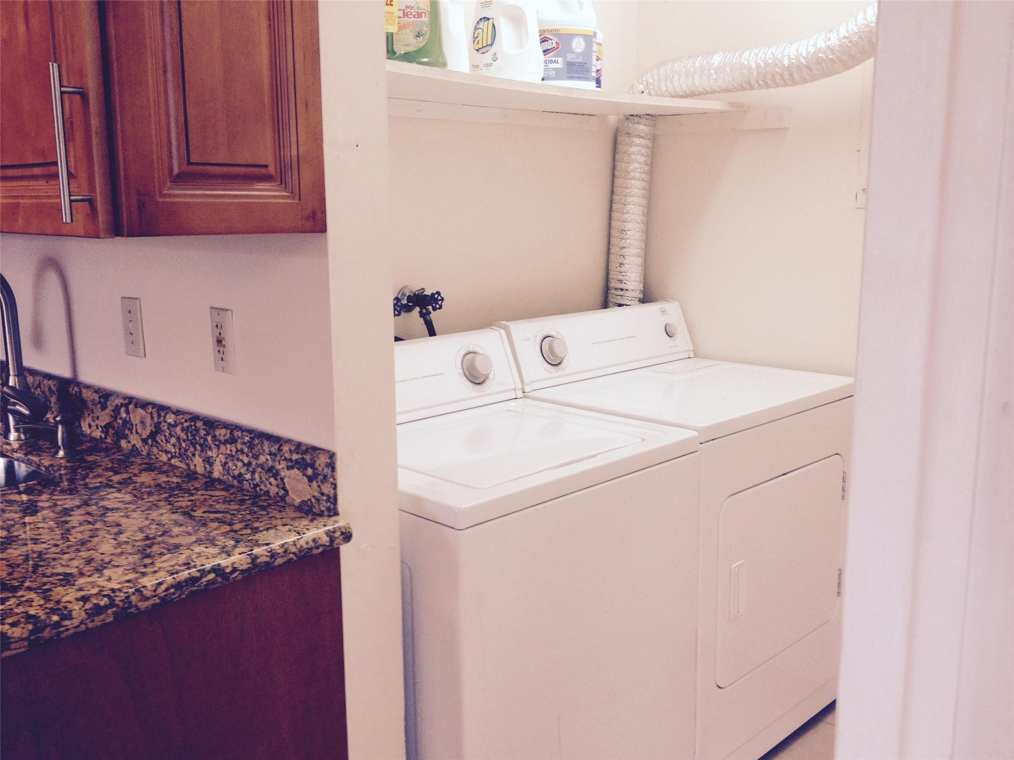 Undisclosed Address Boca Raton, FL 33487 - Photo 9 of 15 a utility room with dryer and washer