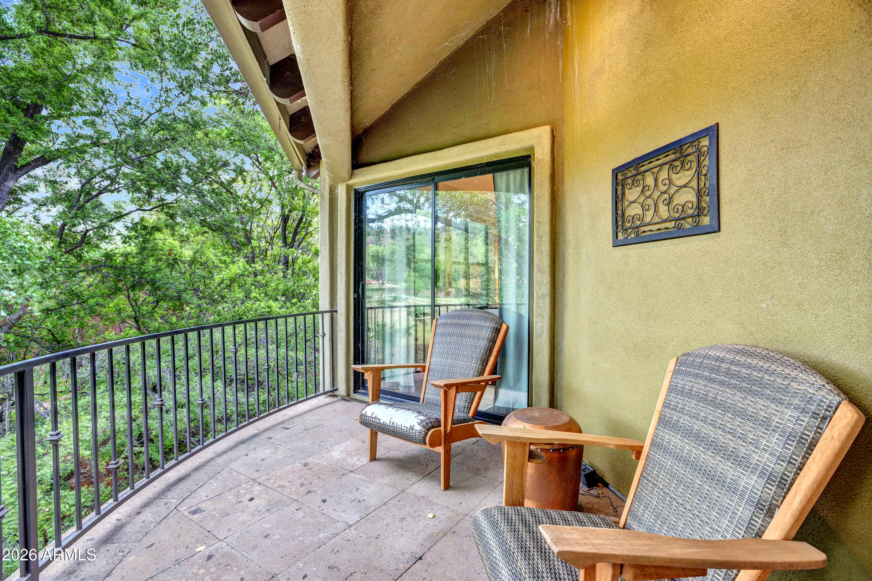 55 Ranch House Circle Sedona, AZ 86336 - Photo 47 of 61 a view of a patio with a table chairs and backyard