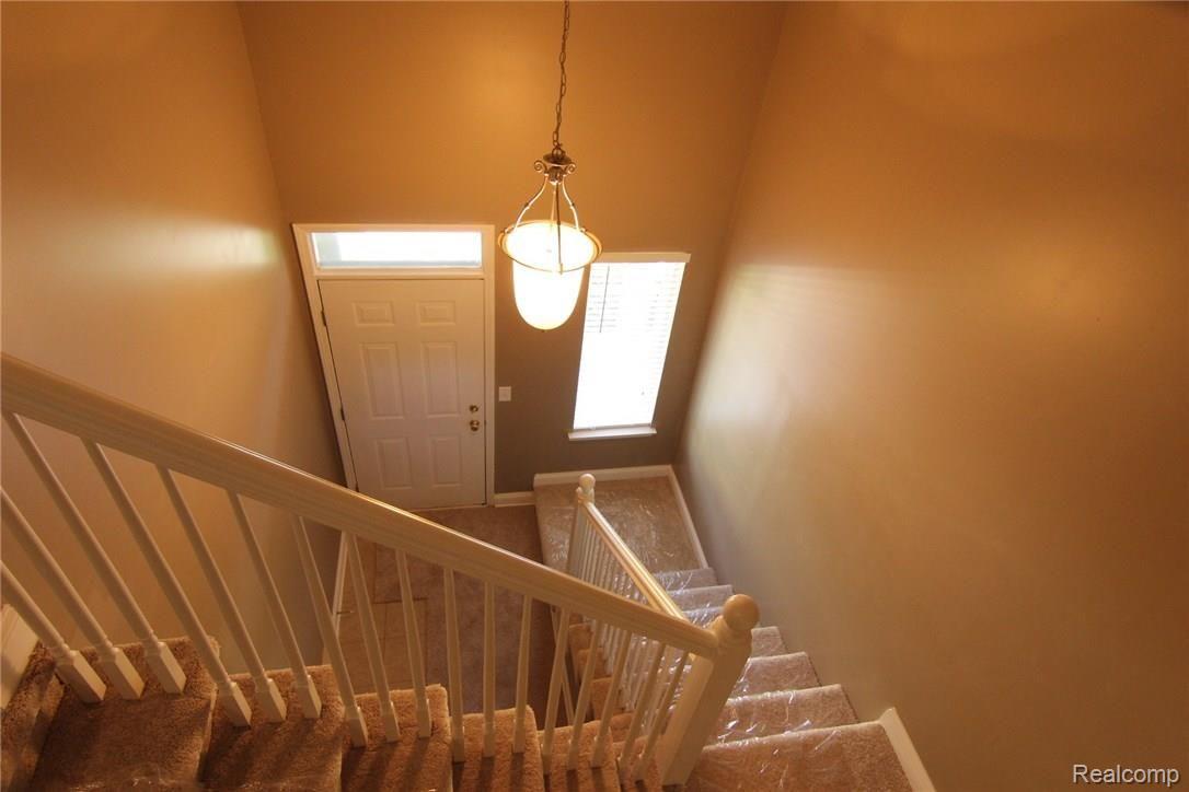 3601 Tremonte Circle, Unit 313 Rochester, MI 48306 - Photo 9 of 34 Stairway.JPG