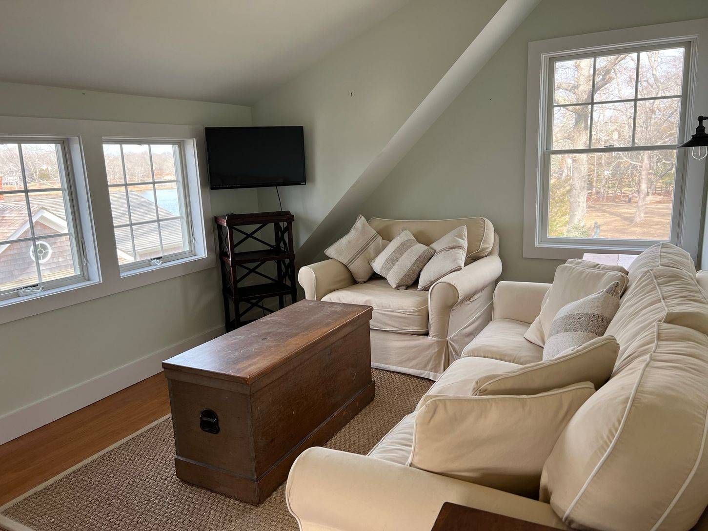 24 South Midway Road Shelter Island, NY 11964 - Photo 13 of 29 a living room with furniture and a flat screen tv