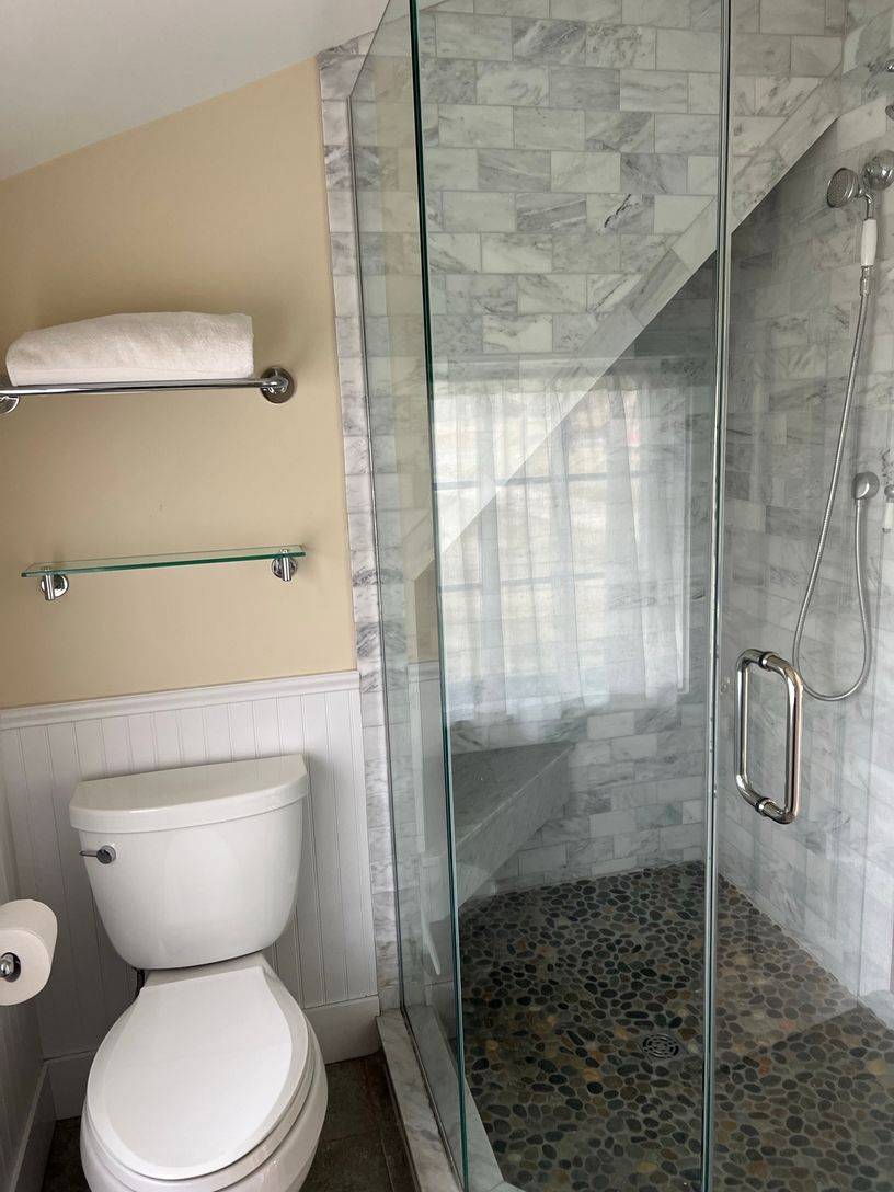 24 South Midway Road Shelter Island, NY 11964 - Photo 21 of 29 a bathroom with a toilet and a shower