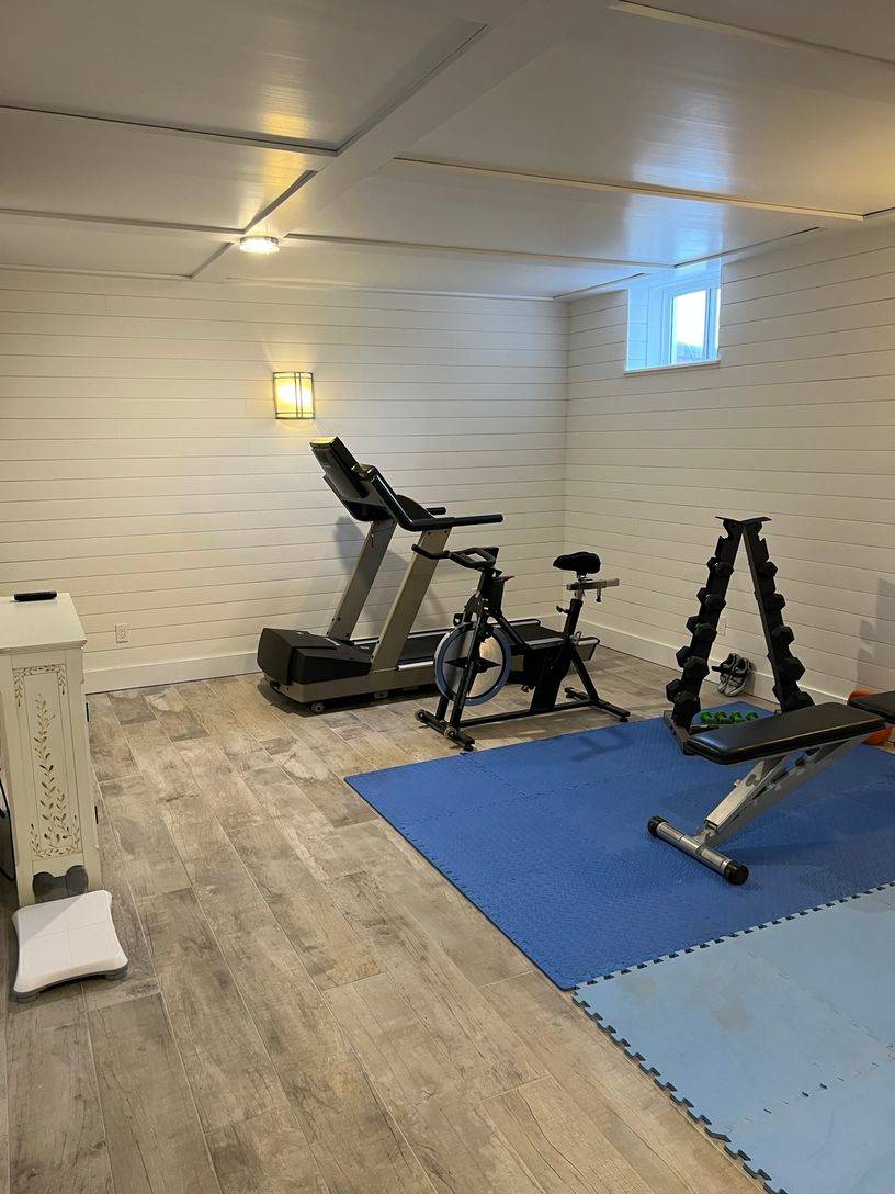 24 South Midway Road Shelter Island, NY 11964 - Photo 25 of 29 a view of a room with gym equipment