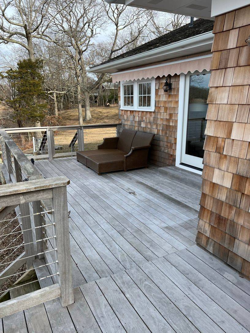 24 South Midway Road Shelter Island, NY 11964 - Photo 27 of 29 a view of house with backyard and seating space