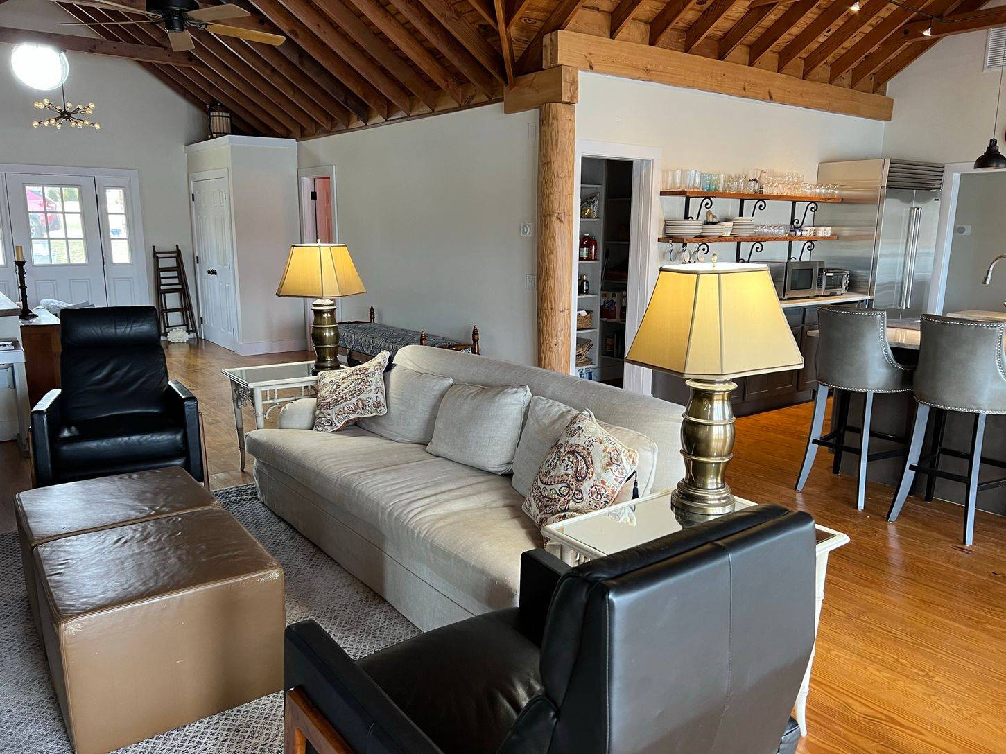 24 South Midway Road Shelter Island, NY 11964 - Photo 7 of 29 a living room with furniture and a table