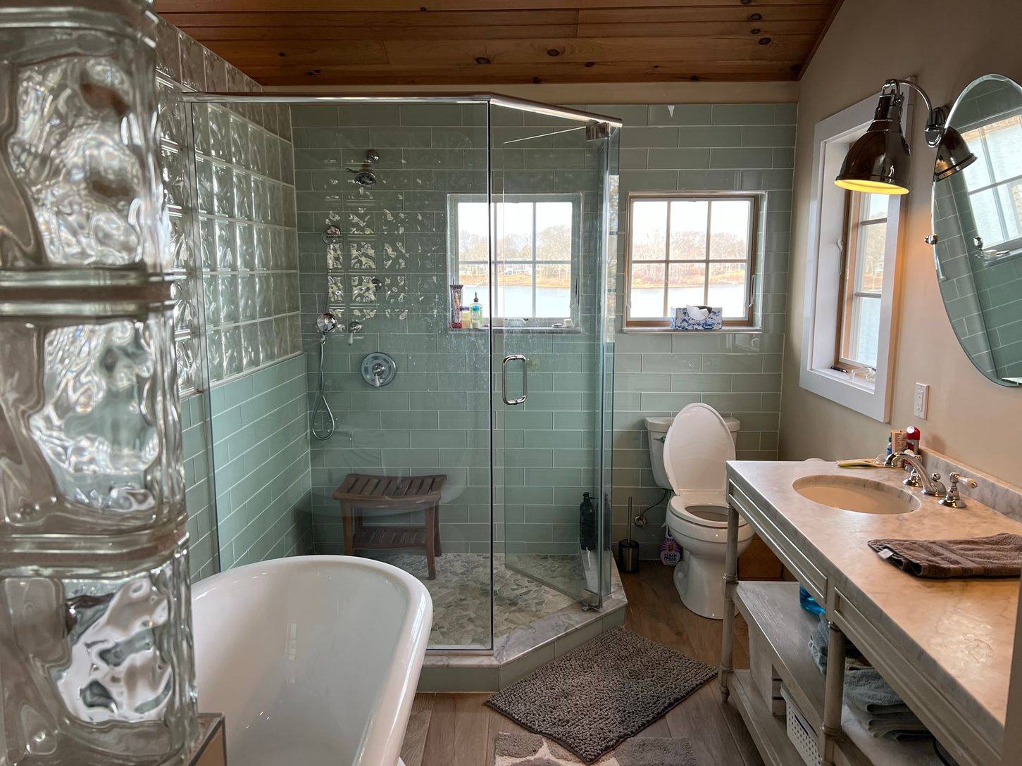 24 South Midway Road Shelter Island, NY 11964 - Photo 10 of 29 a bathroom with a sink a toilet and shower