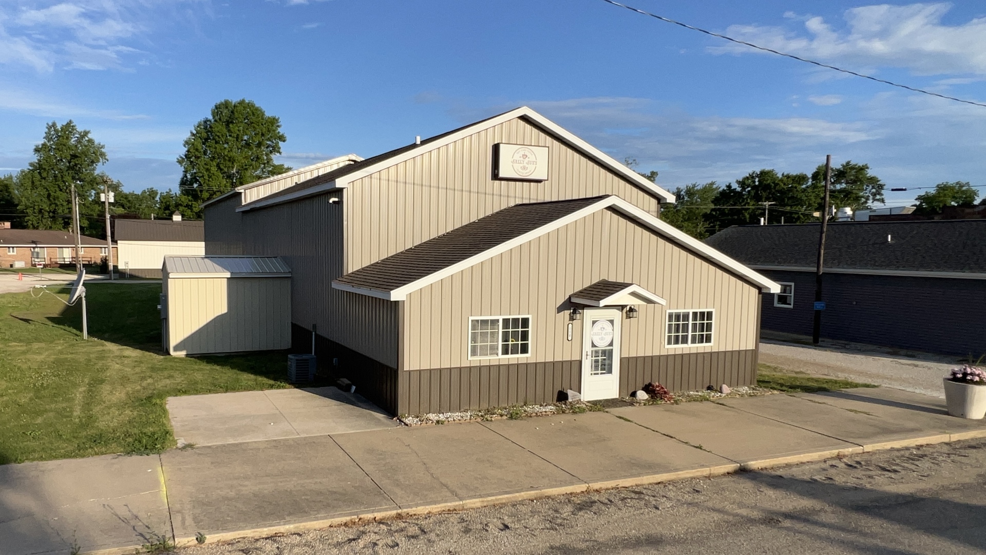 110 North Chicago Street Magnolia, IL 61336 - Photo 2 of 34 a view of a white house with a yard
