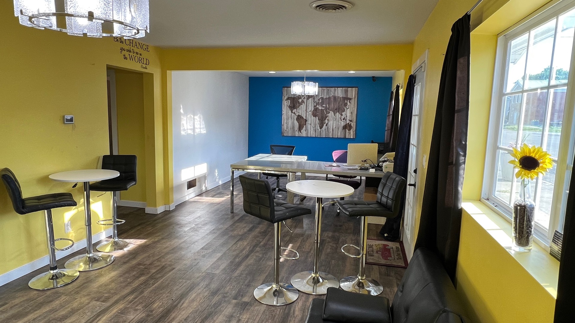 110 North Chicago Street Magnolia, IL 61336 - Photo 9 of 34 a living room with furniture and a painting on the wall
