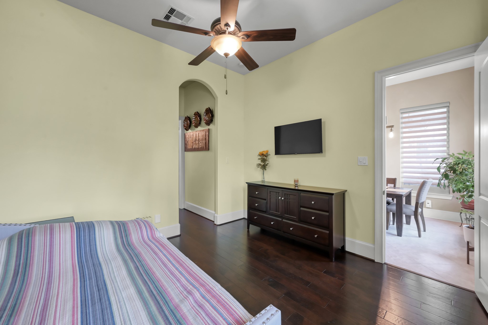 26 Woodborough Way Spring, TX 77389 - Photo 22 of 43 This inviting downstairs bedroom, featuring warm hardwood floors and windows overlooking the landscaped back yard.