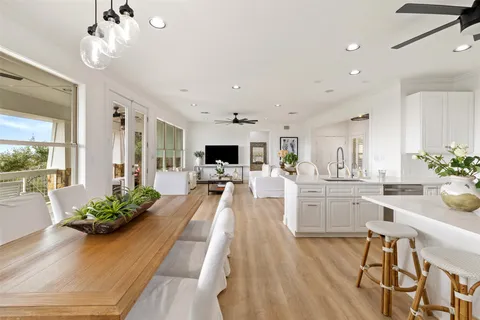 a view of a balcony with wooden floor