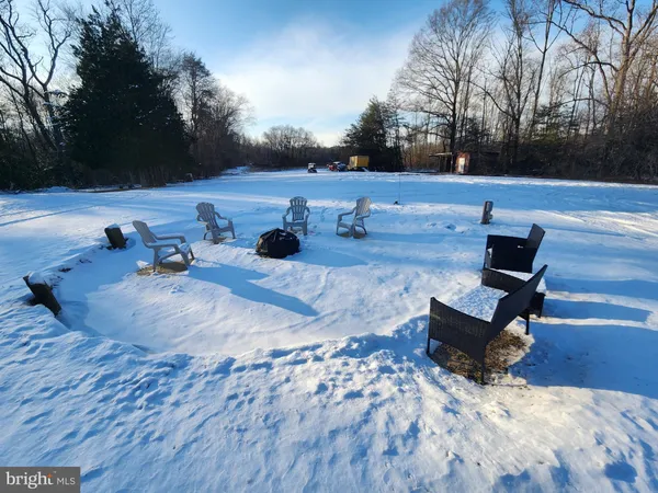 a view of a backyard of the house
