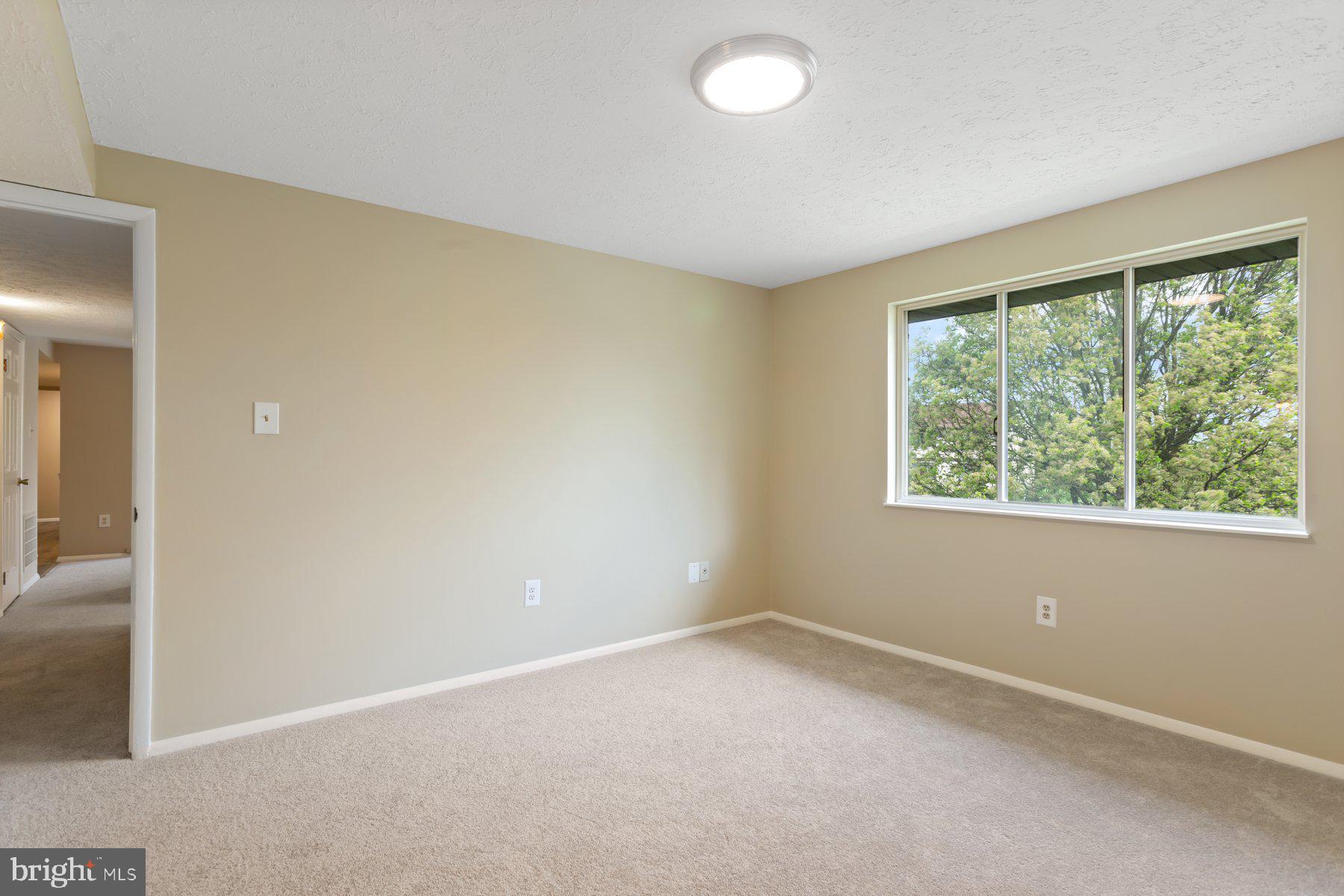 731 L Heather Ridge Drive Frederick, MD 21702 - Photo 17 of 26 Large bedroom and tons of natural light.