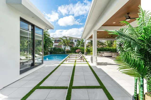 a bathroom with a glass shower door