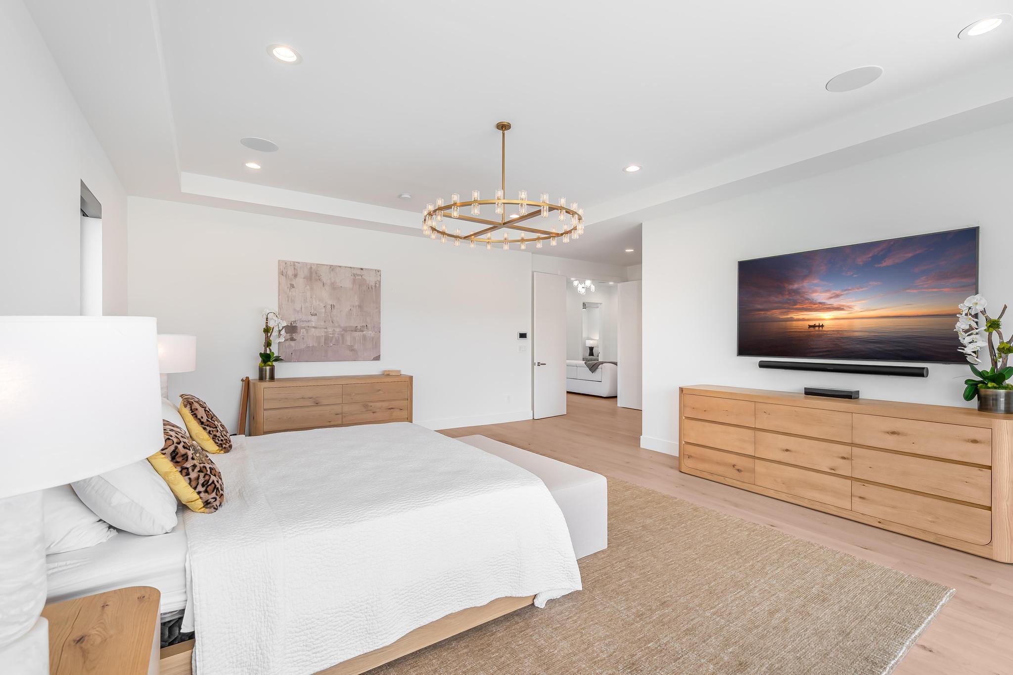 400 Northeast 4th Street Boca Raton, FL 33432 - Photo 37 of 73 a bedroom with a bed and a flat screen tv