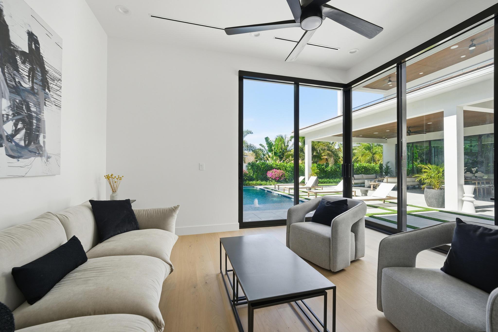 400 Northeast 4th Street Boca Raton, FL 33432 - Photo 71 of 73 a living room with furniture and a large window