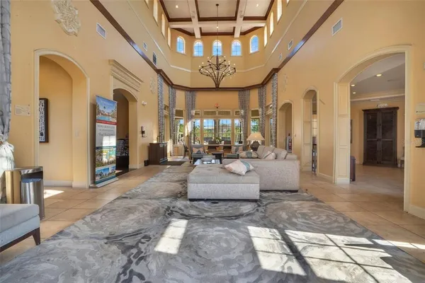 a view of lobby with a couch and stairs