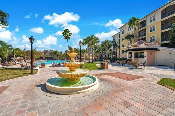 a view of a fountain with a fountain in a yard