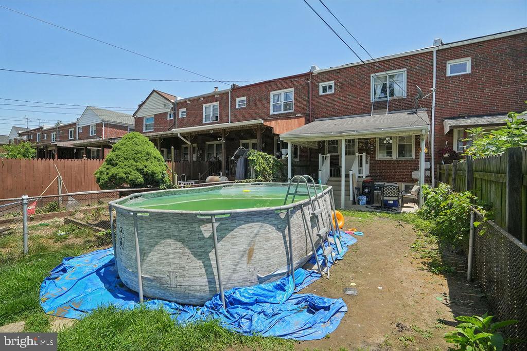 1918 Church Road Baltimore, MD 21222 - Photo 25 of 29 a view of a house with a yard porch and sitting area