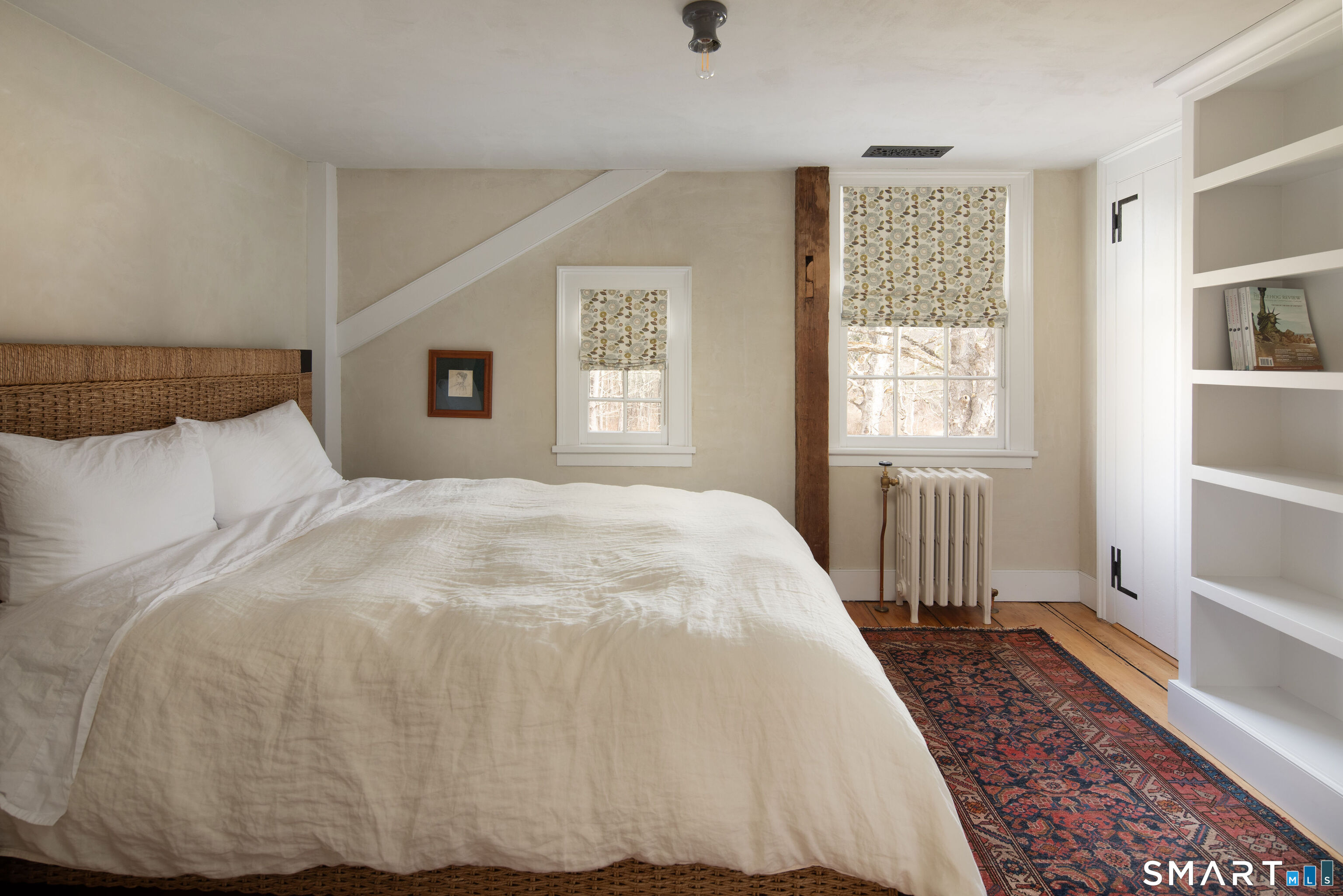 40 Music Mountain Road Canaan, CT 06031 - Photo 20 of 32 a large white bed in a white room