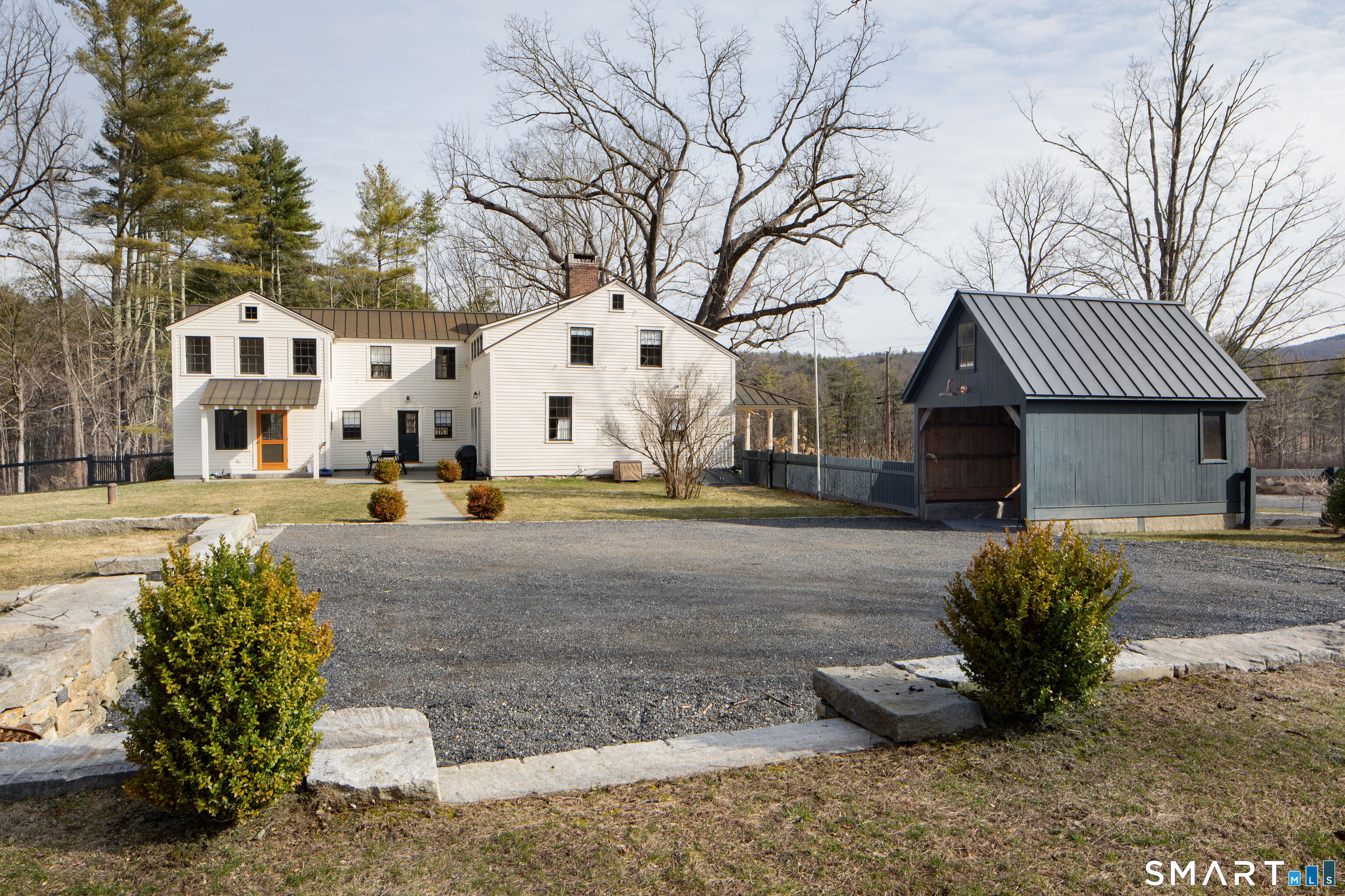 40 Music Mountain Road Canaan, CT 06031 - Photo 25 of 32 a front view of a house with garden