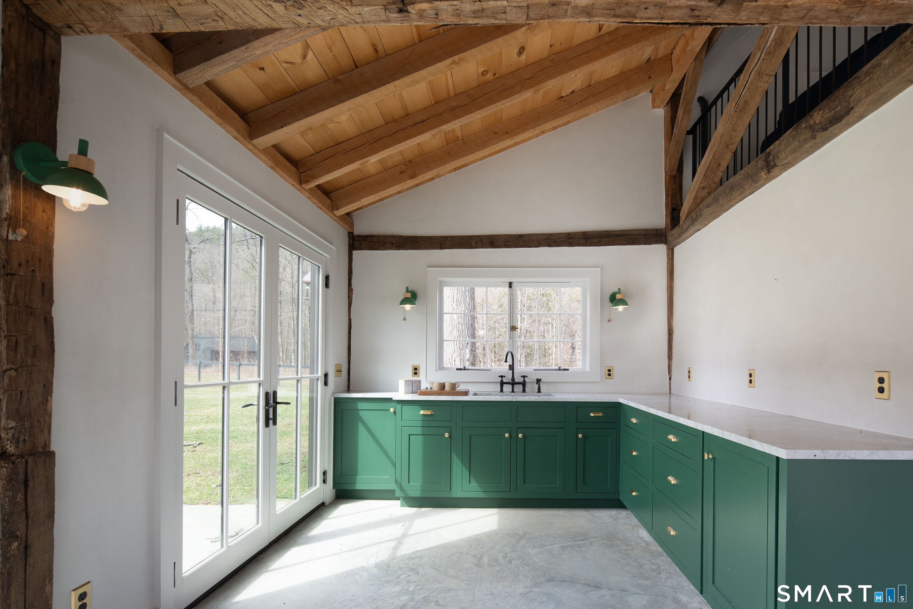 40 Music Mountain Road Canaan, CT 06031 - Photo 28 of 32 a bathroom with a sink and a large mirror