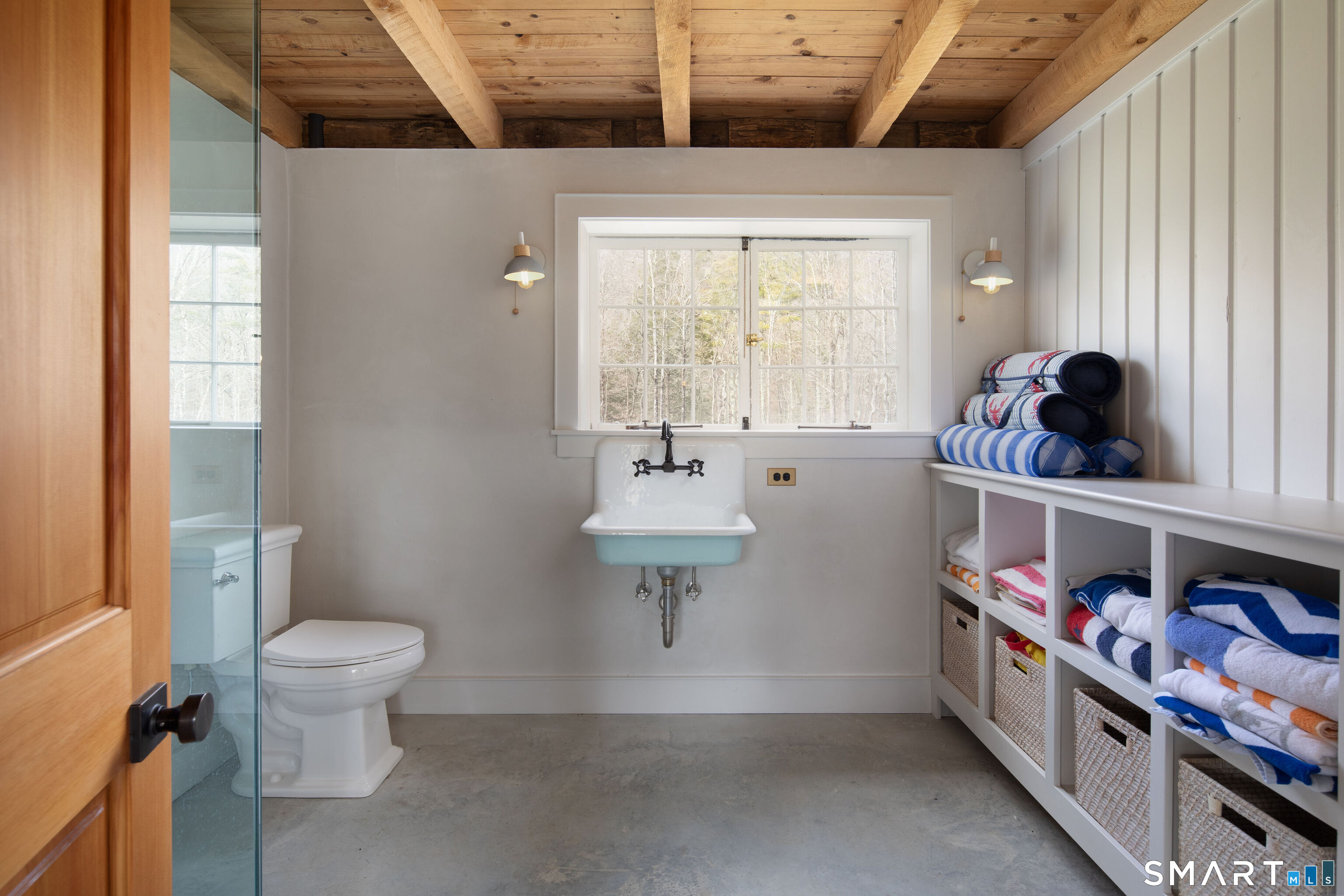 40 Music Mountain Road Canaan, CT 06031 - Photo 30 of 32 a bathroom with a sink a toilet and a window