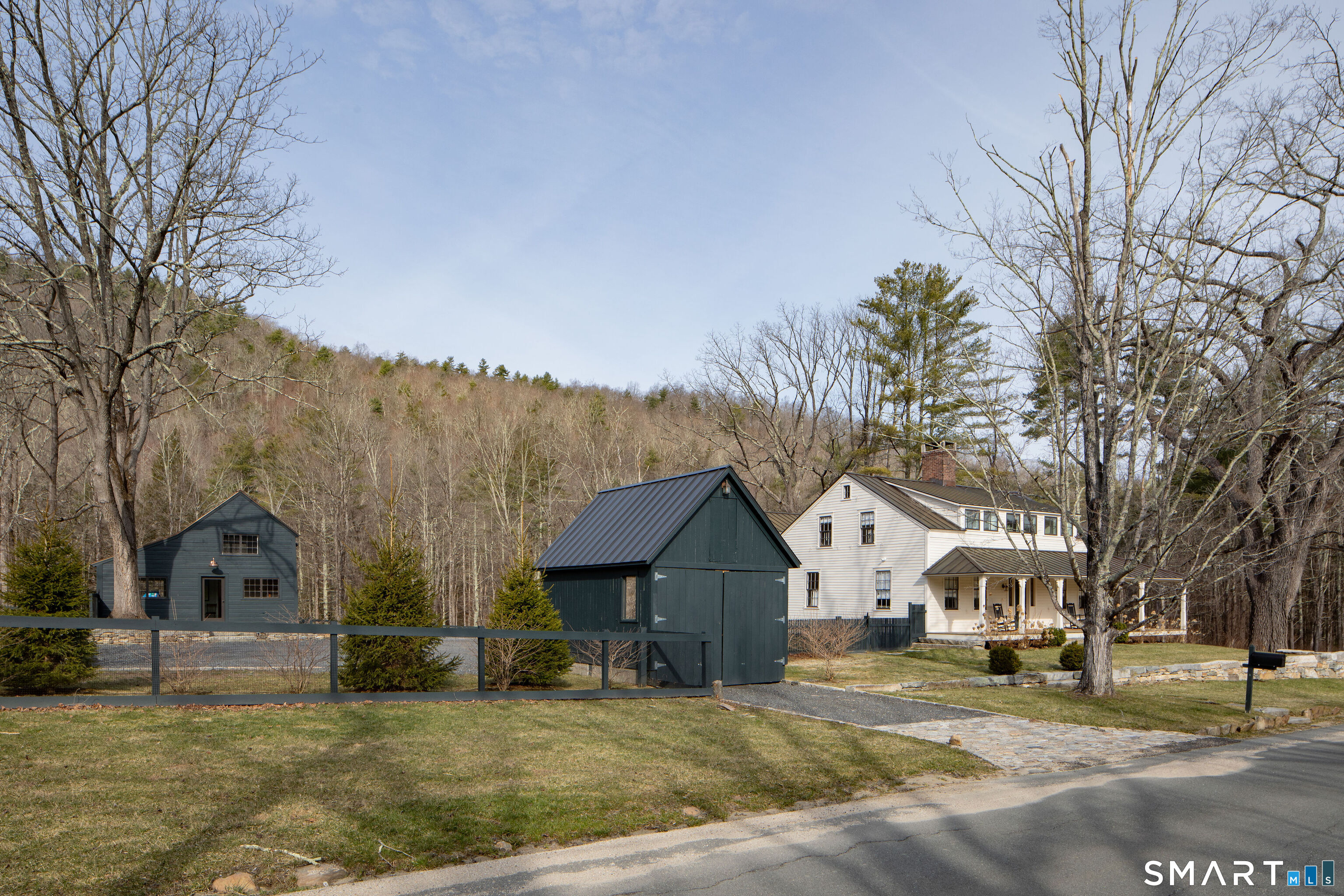 40 Music Mountain Road Canaan, CT 06031 - Photo 32 of 32 a front view of a house with a yard
