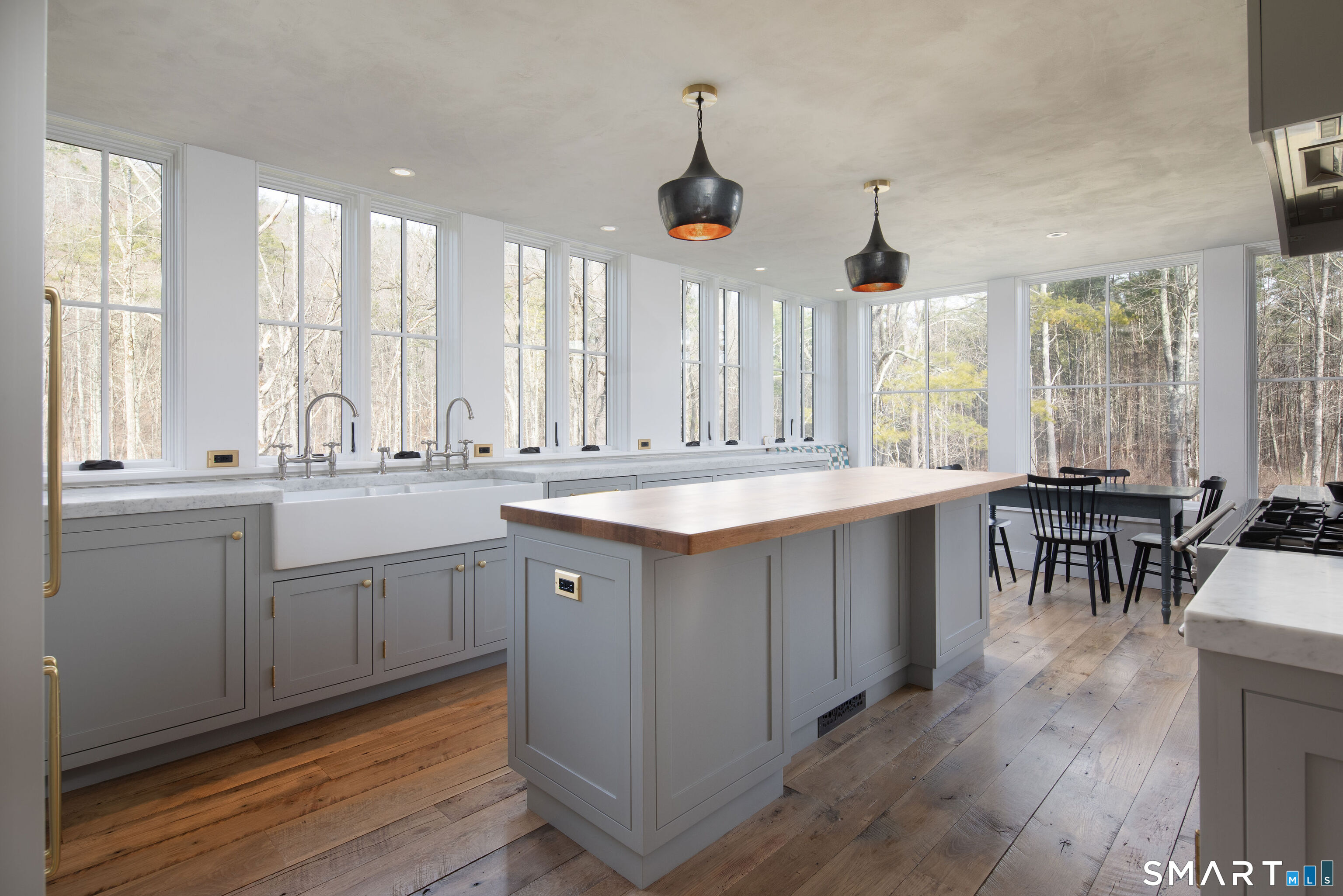 40 Music Mountain Road Canaan, CT 06031 - Photo 5 of 32 a kitchen with sink cabinets and dining table