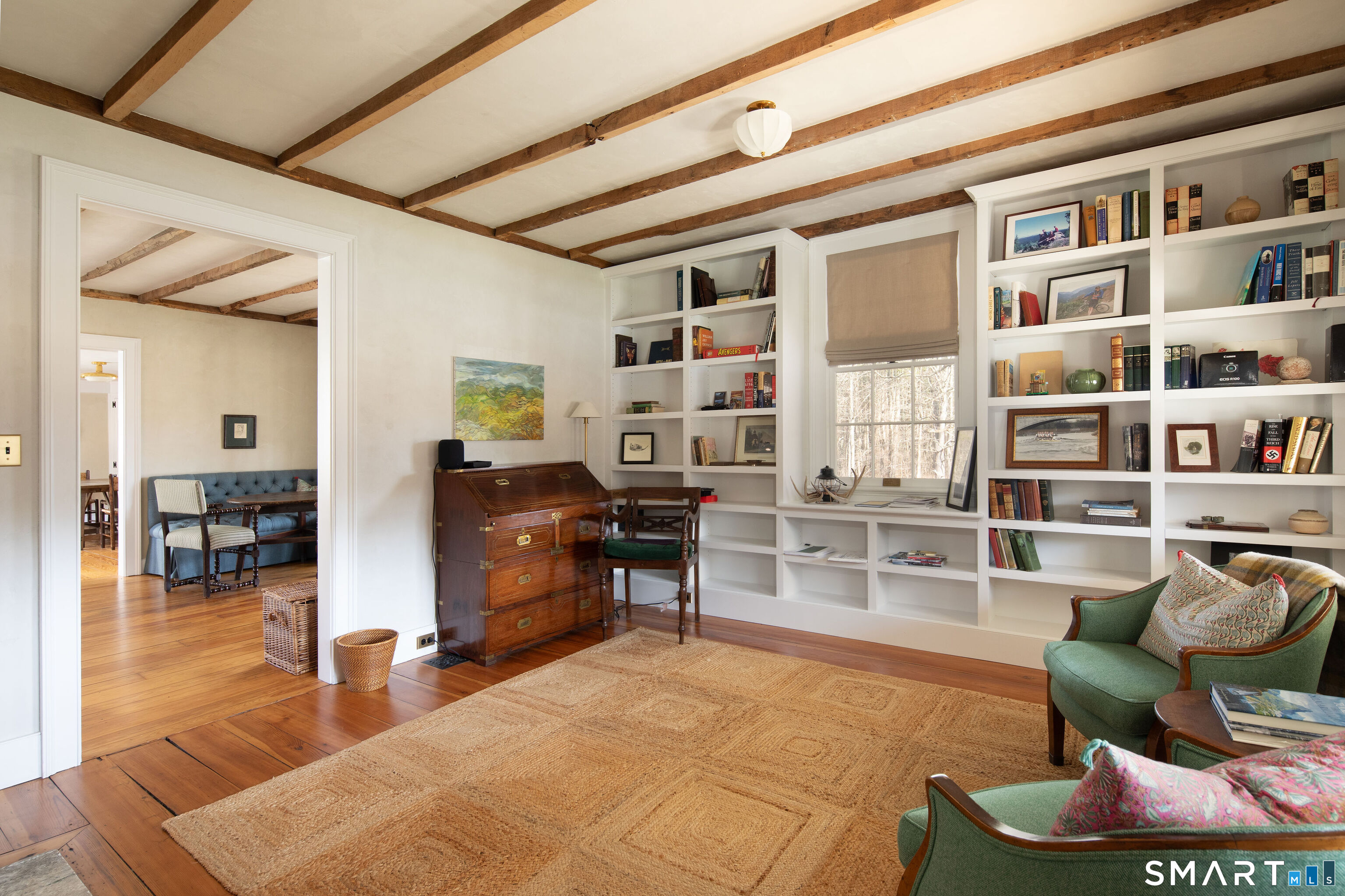 40 Music Mountain Road Canaan, CT 06031 - Photo 9 of 32 a living room with furniture and a book shelf